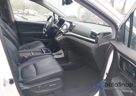 2021 Honda Odyssey Touring z USA, uszkodzony, nr VIN 5FNRL6H80MB008330